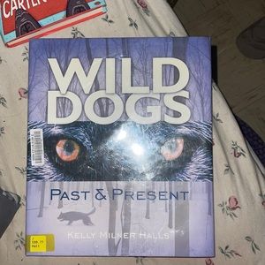 WILD DOGS, Past and present:Kelly Milner Halls
